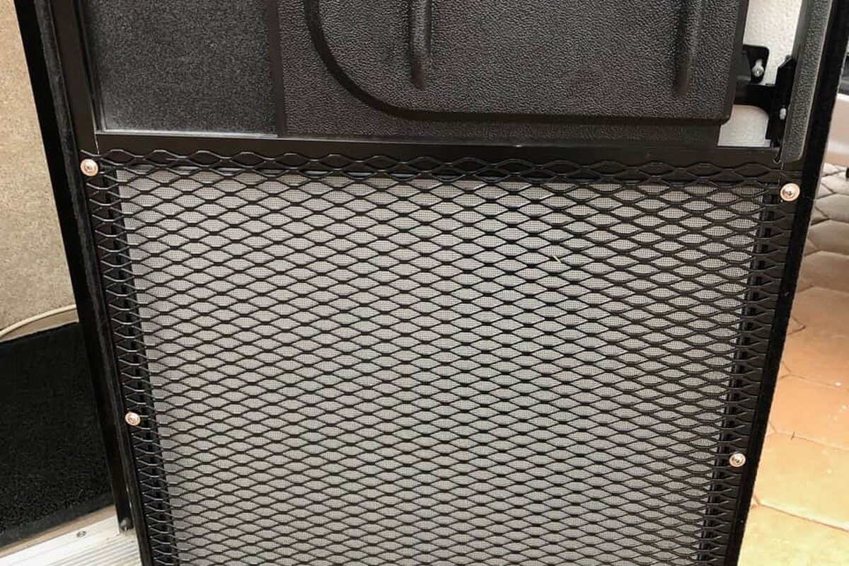Screened Door Pet Guard — project photograph from The Handy Camper